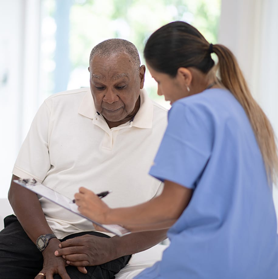 Female-nurse-discussing-SpaceOar-Hydrogel-procedure-with-a-male-patient Female-nurse-discussing-SpaceOar-Hydrogel-procedure-with-a-male-patient