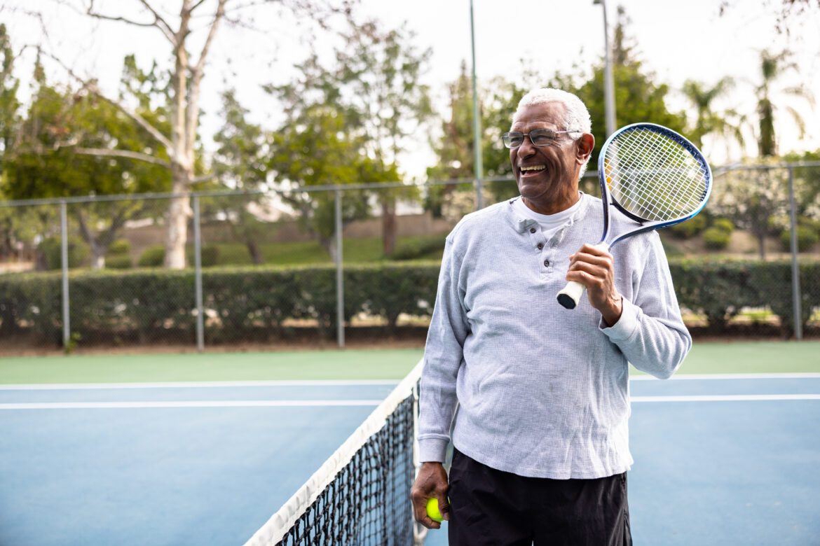 Portrait of a senior black man on the tennis court Portrait of a senior black man on the tennis court