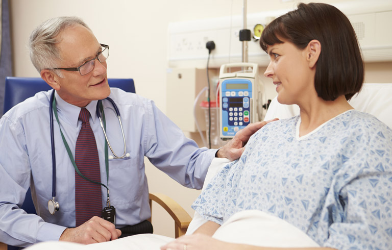 Doctor-examining-patient-after-injections