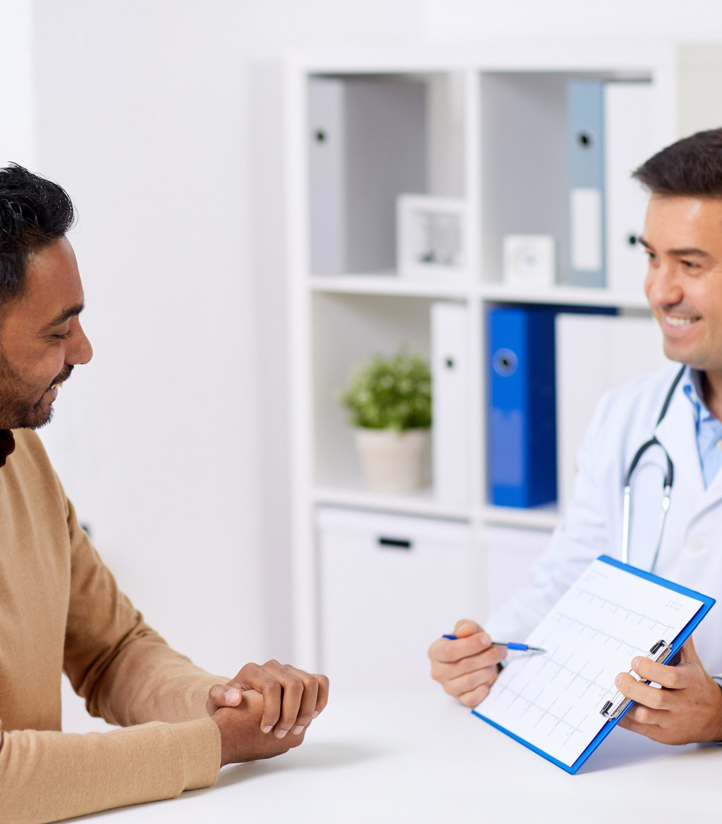 Doctor-talking-to-patient-about-peyronie's-disease