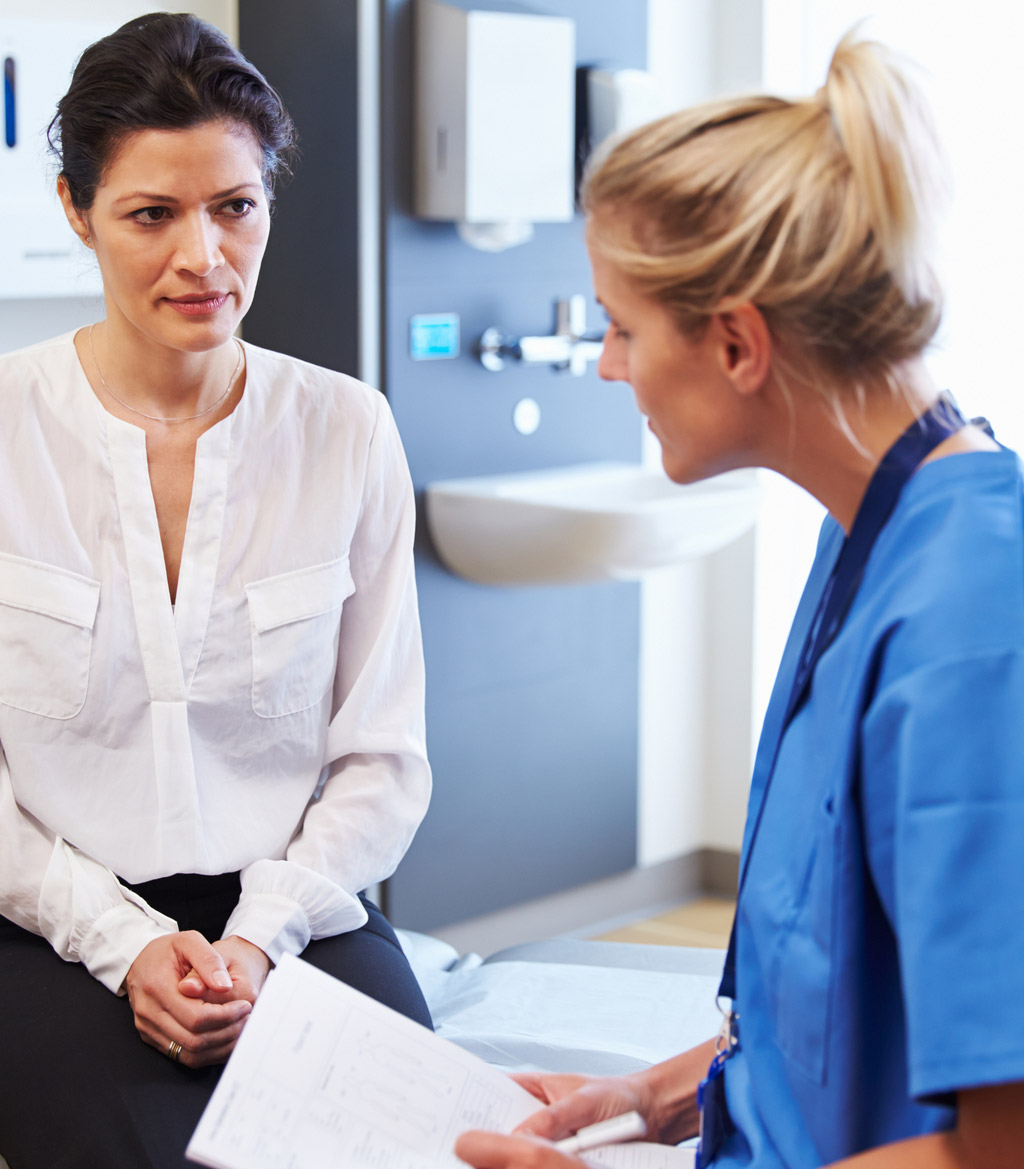 Specialist-consulting-patient-over-genitourinary-fistula-repair