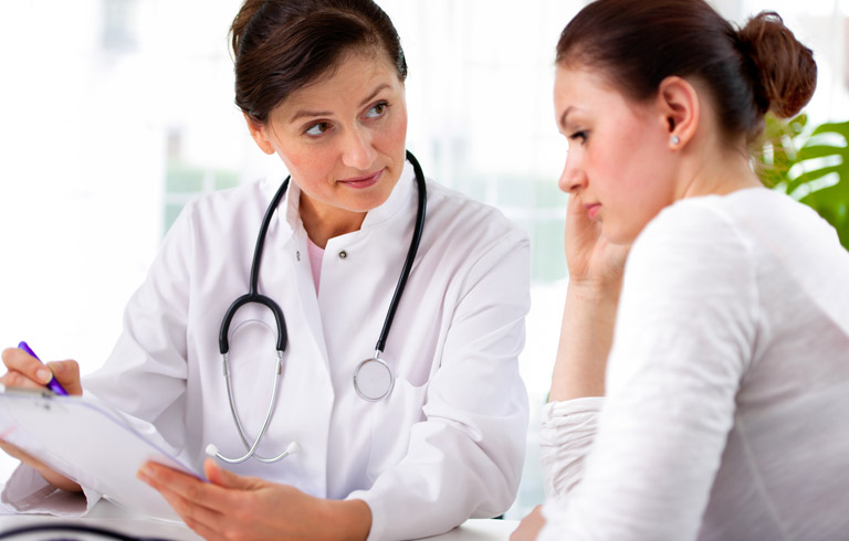 Specialist-explaining-genitourinary-fistula