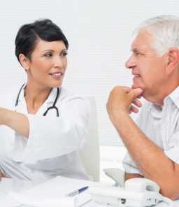 Doctor-consulting-patient-for-microscopic-varicocele-surgery