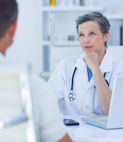 Doctor-consulting-patient-over-prostatectomy