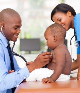 Doctor-examining-baby-patient-for-undescended-testicle