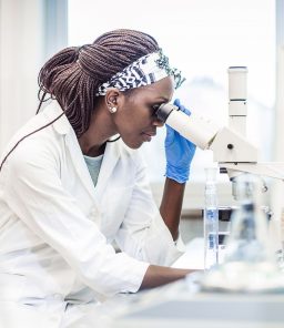 Female-scientist-in-the-laboratory-examining-a-transperineal-biopsy