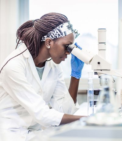Female-scientist-in-the-laboratory-examining-a-transperineal-biopsy