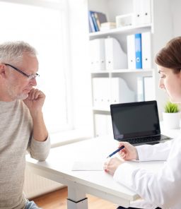 Specialist-consulting-patient-for-urinary-incontinence