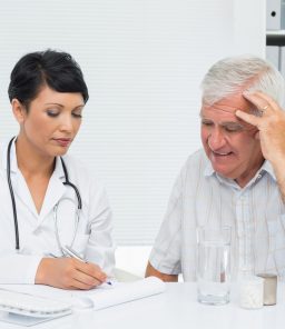 Specialist-helping-patient-with-peyronie's-disease